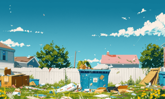 summer day with a clear blue sky showcasing a dumpster being filled